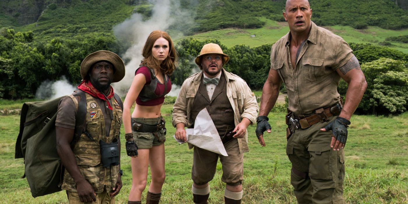 The players in a field in Jumanji Welcome to the Jungle.
