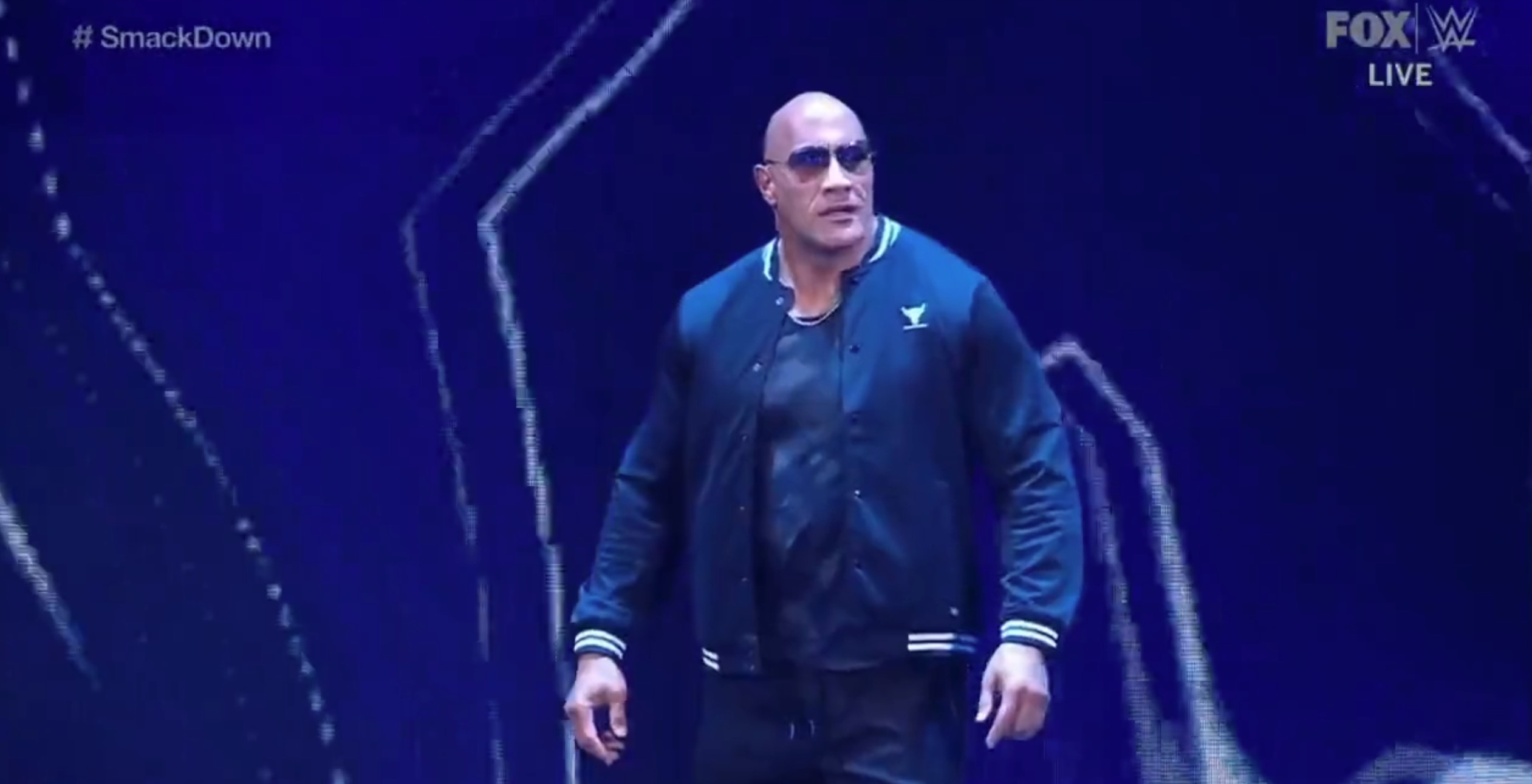 Dwayne 'The Rock' Johnson has returned to the WWE after six years, making a shock appearance on Friday's SmackDown
