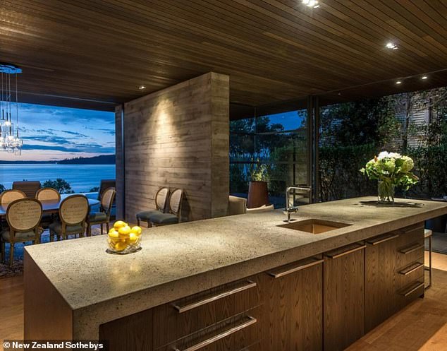The home at 20 Rawene Street in Auckland features stone and wood throughout