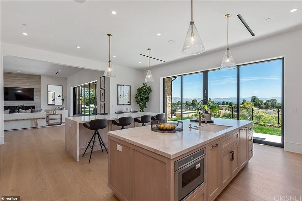 Hungry: For the foodie, there is a chef's gourmet kitchen with two islands and an adjoining butler's pantry