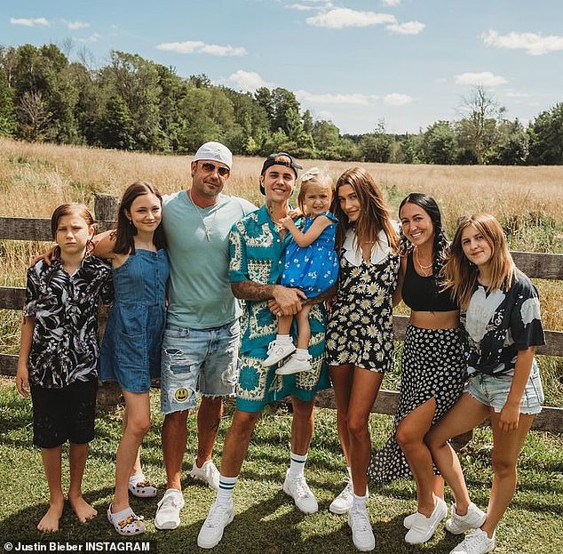 Family on the farm: The Holy singer shared three group pictures of the clan at a farm in Canada