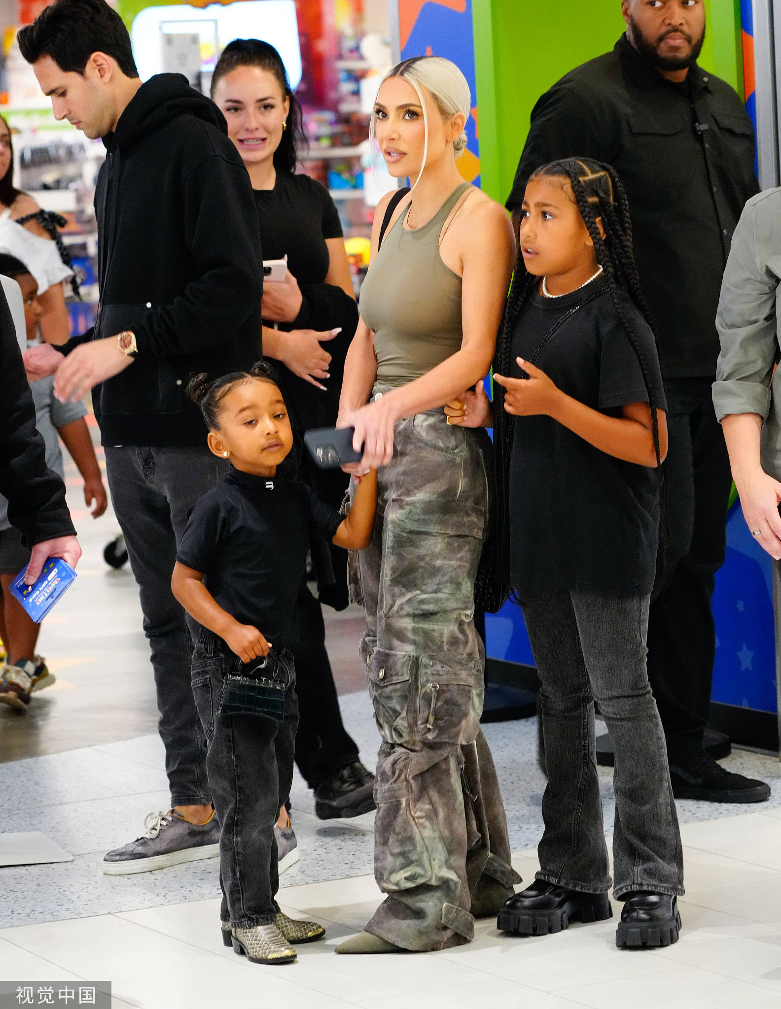 Kim Kardashian Models A Sheer Nude Top In Nyc As Her Daughters North And Chicago Carry Purses